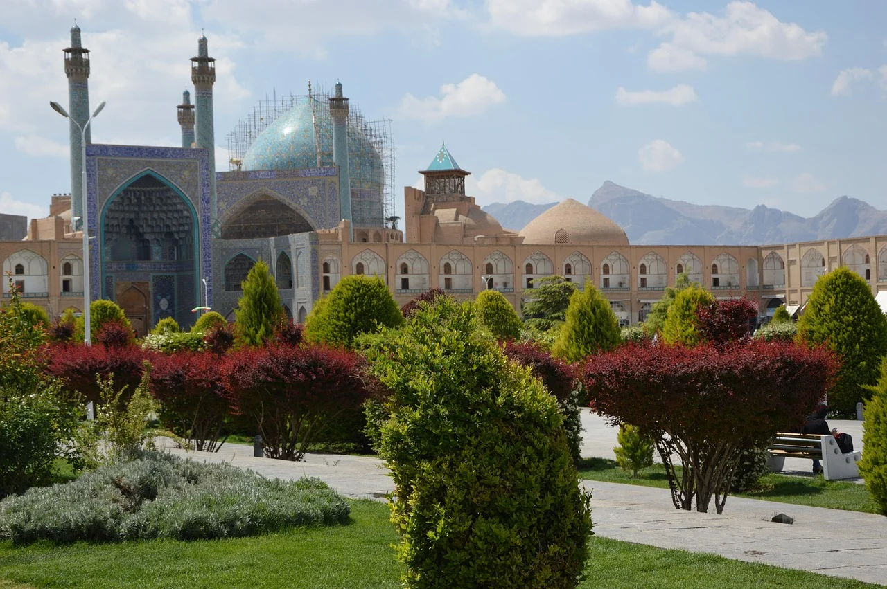 Overview of Naqsh-e Jahan Square in Isfahan with the Shah Mosque and its gardens, a destination where everything is paid in cash